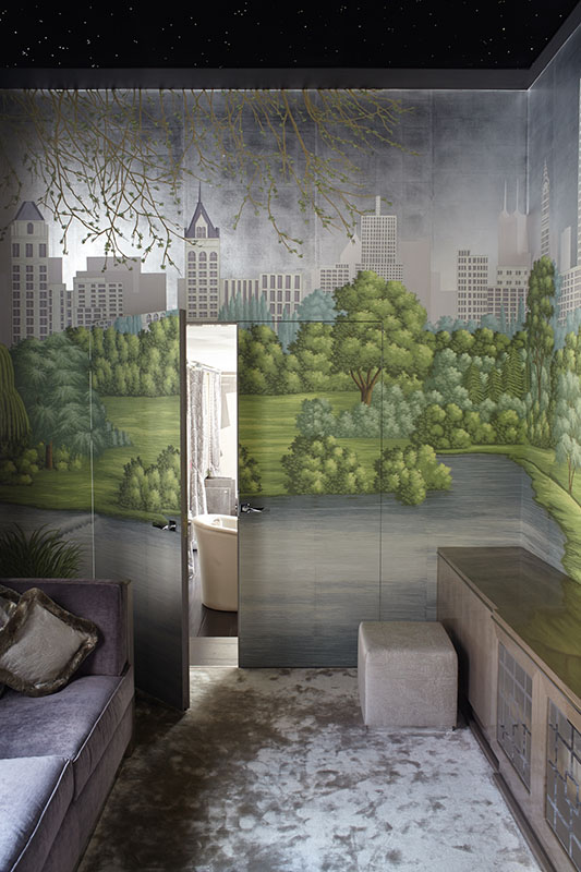 Room entirely decorated with city landscape wallpaper