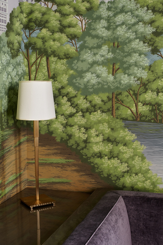 Detail of a design lamp in a corner with Misha wallpaper