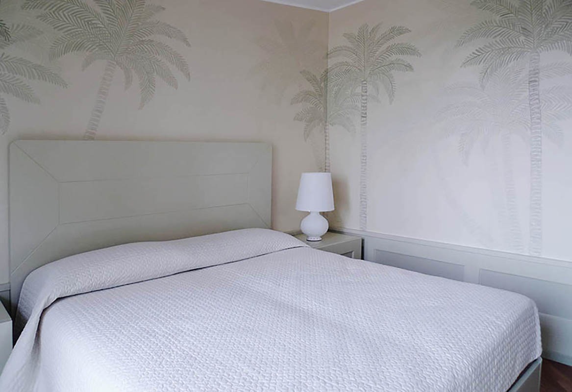 delicate palm for bedroom wallcoverings on white background