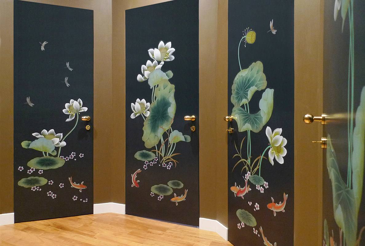 metallic wallcoverings with fish pattern hand painted on door