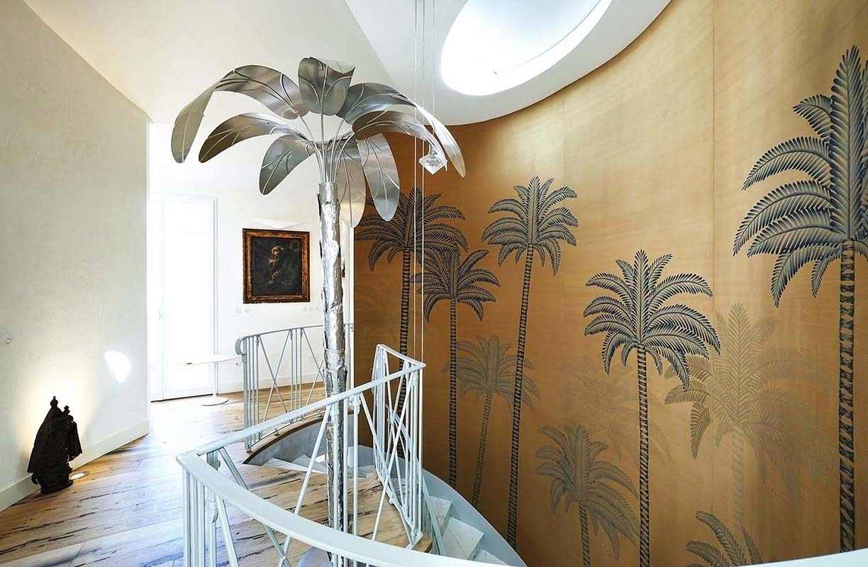 palm tree on gold dupion silk wallcoverings display beautifully at hall of house